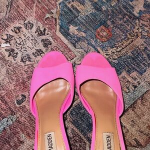 Hot pink short heel worn Steve Madden heels